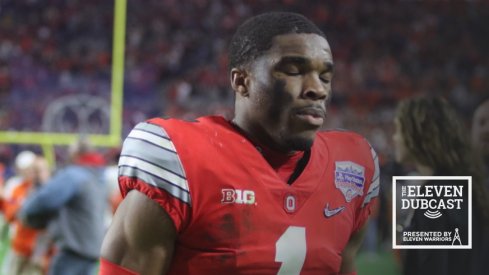 Jeff Okudah walks off the field after a loss to Clemson in the Fiesta Bowl