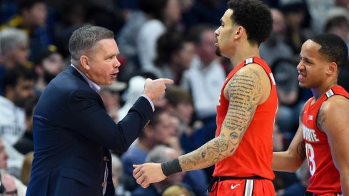 Chris Holtmann and Duane Washington Jr.