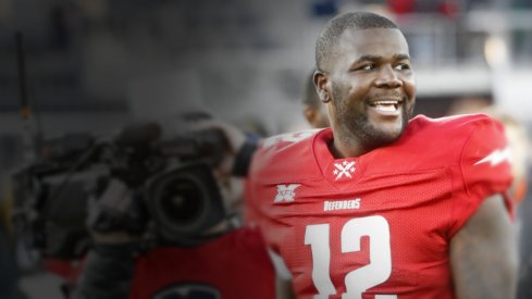 Feb 8, 2020; Washington, DC, USA; DC Defenders quarterback Cardale Jones (12) smiles while leaving the field after the Defenders game against the Seattle Dragons in an XFL football game at Audi Field. Mandatory Credit: Geoff Burke-USA TODAY Sports