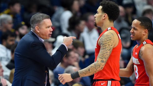 Chris Holtmann and Duane Washington Jr.