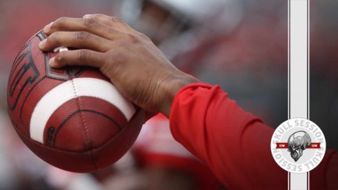 Justin Fields holds a ball in today's skull session.