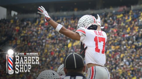 Chris Olave celebrates at Michigan Stadium.