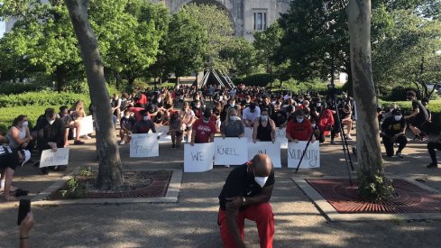 Ohio State athletes and staff participate in the Kneel for Nine.