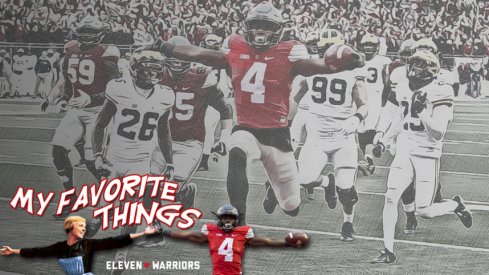 Ohio State Curtis Samuel leaps into the end zone during the second overtime of Ohio State's 30-27 win over Michigan at Ohio Stadium in Columbus, Ohio on Saturday, November 26, 2016