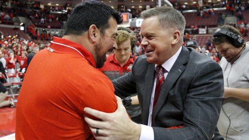 Ohio State football coach Ryan Day embracing Ohio State basketball coach Chris Holtmann