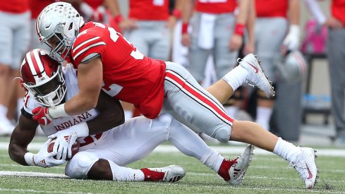 Tuf Borland tackles Stevie Scott in the 2018 Ohio State-Indiana game