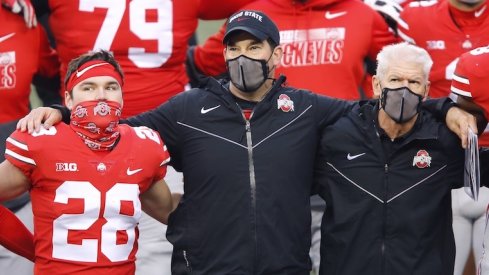 Nov 21, 2020; Columbus, Ohio, USA; Ohio State Buckeyes head coach Ryan Day (center) and defensive coordinator Kerry Coombs(right) and place kicker Dominic DiMaccio (28)after the game against the Indiana Hoosiers at Ohio Stadium. Mandatory Credit: Joseph Maiorana-USA TODAY Sports