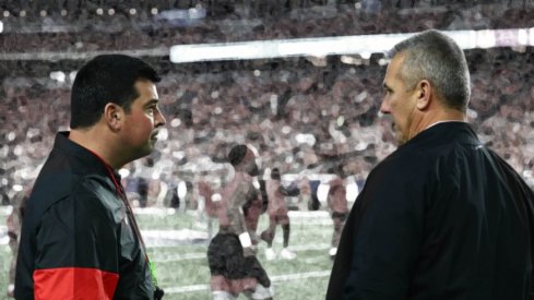 Dec 28, 2019; Glendale, AZ, USA; Ohio State Buckeyes current head coach Ryan Day talks with former head coach Urban Meyer before the 2019 Fiesta Bowl college football playoff semifinal game against the Clemson Tigers at State Farm Stadium. Mandatory Credit: Matthew Emmons-USA TODAY Sports