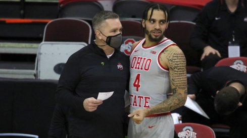 Chris Holtmann and Duane Washington Jr.