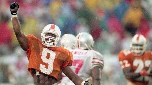 On a day of big plays by Tennessee, Vols defensive back Tori Noel (9) celebrates after recovering an Ohio State fumble in the Citrus Bowl game in Orlando, Fla., Jan. 1, 1996. With both teams tied in the rankings at No. 4 going into the game, Tennessee came out on top 20-14.