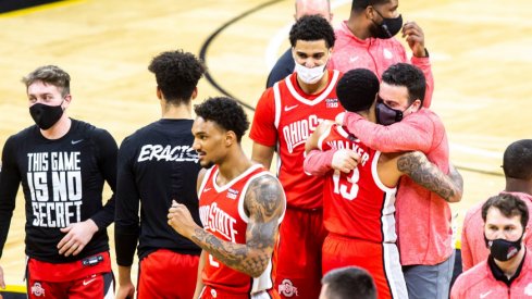 Ohio State men's basketball celebrates after a big win on the road against Iowa