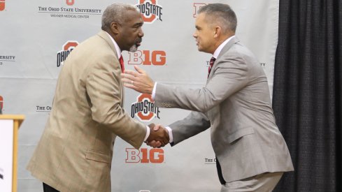 Chris Holtmann and Gene Smith