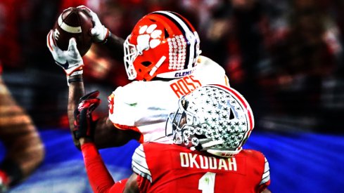 Dec 28, 2019; Glendale, Arizona, USA; Ohio State Buckeyes cornerback Jeff Okudah (1) breaks up a pass against Clemson Tigers Justyn Ross (8) in the third quarter in the 2019 Fiesta Bowl college football playoff semifinal game. The play was reviewed and not ruled a fumble. Mandatory Credit: Matthew Emmons-USA TODAY Sports