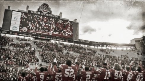 The Ohio State Buckeyes sing "Carmen Ohio" following a 48-3 win over the Michigan State Spartans during Saturday's NCAA Division I football game at Ohio Stadium in Columbus on November 11, 2017. [Barbara J. Perenic/Dispatch]