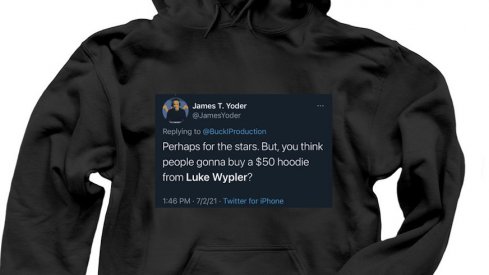 Luke Wypler is selling a shirt.