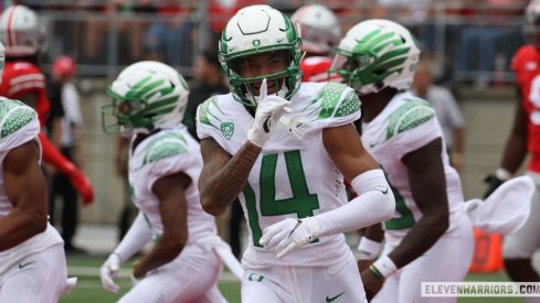 Oregon's Kris Hutson quiets the Ohio Stadium crowd after a 30-yard reception.