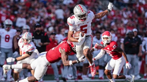 Garrett Wilson leads Ohio State in receptions and receiving yards through five games. 