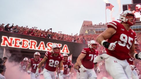 Oct 9, 2021; Lincoln, Nebraska, USA; The Nebraska Cornhuskers head onto the field before facing off against the Michigan Wolverines at Memorial Stadium. Mandatory Credit: Dylan Widger-USA TODAY Sports