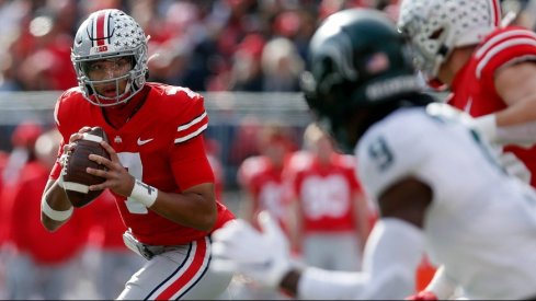 C.J. Stroud prepares to fire a strike against Michigan State. 