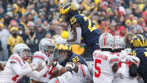 Michigan running back Hassan Haskins scores