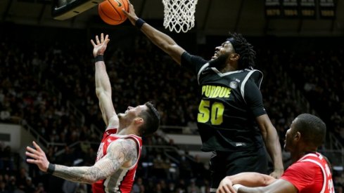 Trevion Williams blocks Kyle Young’s shot