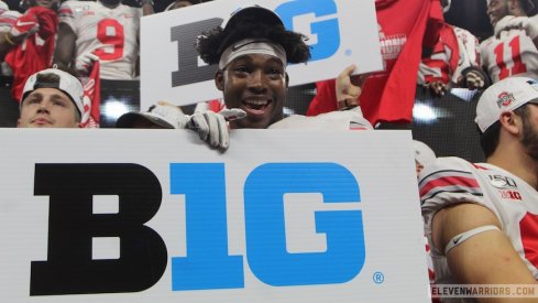 Javontae Jean-Baptiste with Big Ten sign