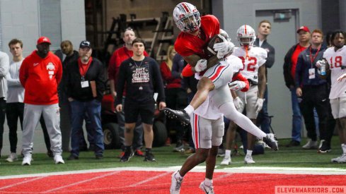 Jaxon Smith-Njigba makes a catch in practice