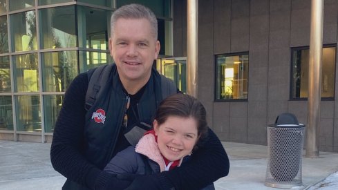 Chris Holtmann and his daughter