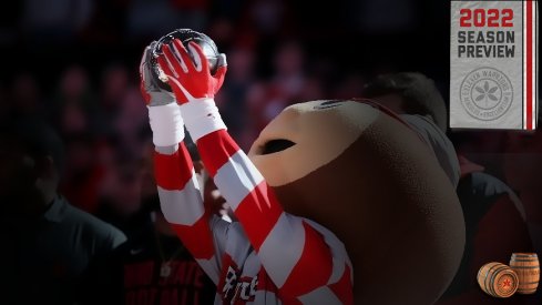 Jan 23, 2020; Columbus, Ohio, USA; Ohio State's Brutus Buckeye holds up the Big Ten Football Championship Trophy as part of the teams recognition at halftime against the Minnesota Golden Gophers at Value City Arena.
