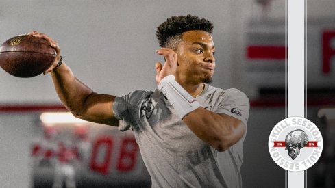 Justin Fields throwing darts.