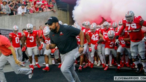 Ryan Day runs out with his team