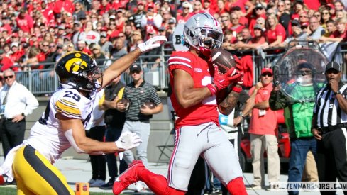 Ohio State's Emeka Egbuka hauls in a touchdown against Iowa