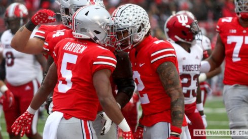 Dallan Hayden and Emeka Egbuka celebrate a touchdown.