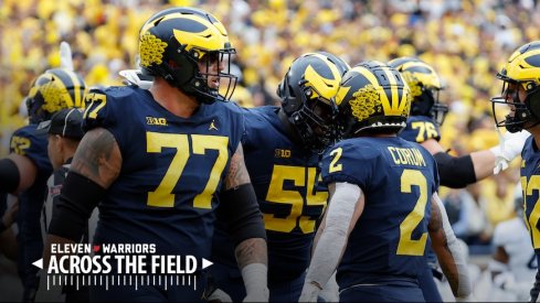 Blake Corum and the Michigan Wolverines celebrate a touchdown.