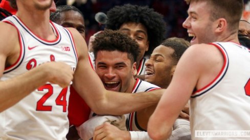Tanner Holden celebrates his buzzer-beater three-pointer to beat Rutgers.