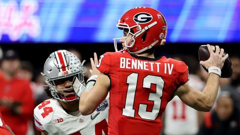 Georgia quarterback Stetson Bennett IV attempts a pass in the Peach Bowl