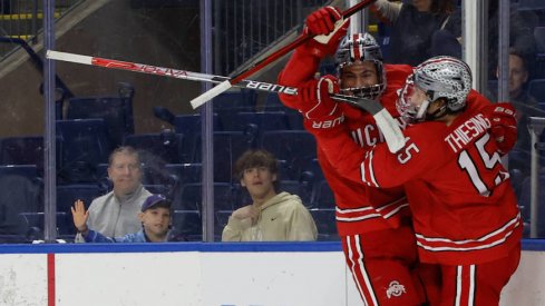 The Buckeyes celebrate after one of their eight goals vs. Harvard.