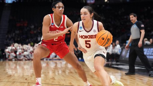 Virginia Tech’s Georgia Amoore drives past Ohio State’s Taylor Thierry.