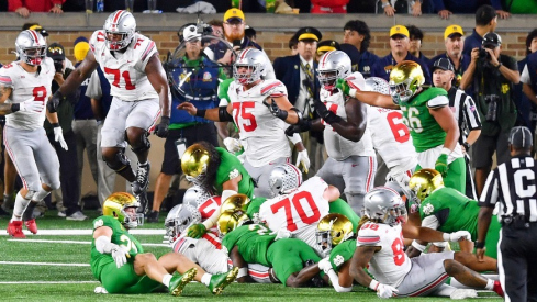 Ohio State celebrating following Chip Trayanum's game-winning touchdown.