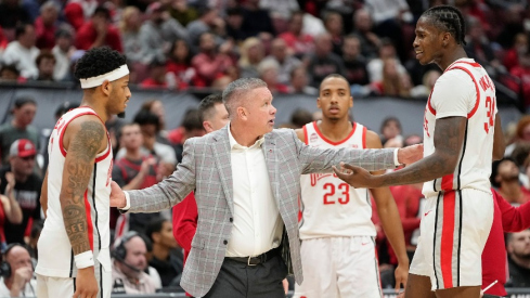 Roddy Gayle Jr., Chris Holtmann and Felix Okpara