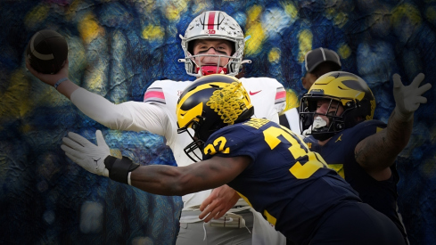 Nov 25, 2023; Ann Arbor, Michigan, USA; Ohio State Buckeyes quarterback Kyle McCord (6) is hit by Michigan Wolverines defensive end Jaylen Harrell (32) as he throws an interception during the second half of the NCAA football game at Michigan Stadium. Ohio State lost 30-24.