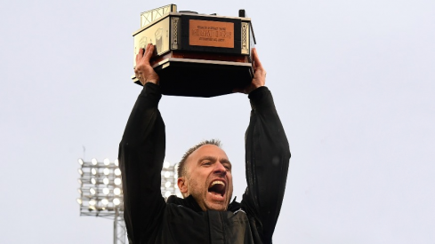 Dec 28, 2023; Boston, MA, USA; Boston College Eagles head coach Jeff Hafley lifts the champions trophy after defeating the Southern Methodist Mustangs in the Wasabi Fenway Bowl at Fenway Park. Mandatory Credit: Eric Canha-USA TODAY Sports