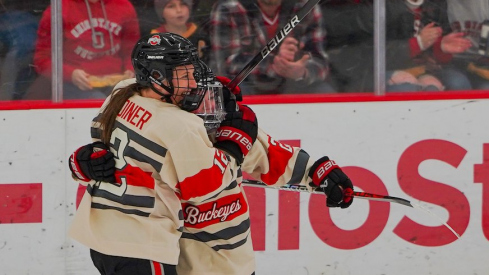 Ohio State women’s hockey celebrates a goal in Saturday’s win over St. Thomas