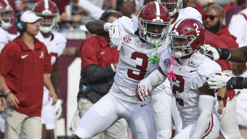 Terrion Arnold celebrates with Caleb Downs after Downs made a big play at Alabama in 2023.