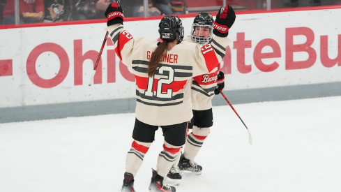 Jenn Gardiner and Cayla Barnes celebrate a goal during Ohio State’s Feb. 17 win over St. Thomas
