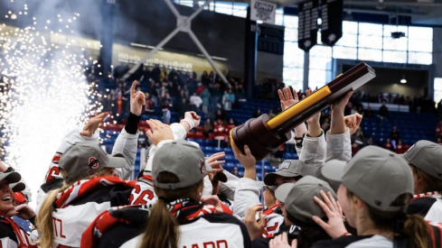 Ohio State celebrates with the national championship trophy