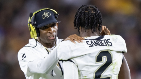 Colorado Buffaloes head football coach Deion Sanders and his son Shedeur Sanders