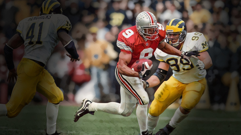 Nov 21, 1998; Columbus, OH, USA; Ohio State Buckeyes receiver David Boston (9) runs after a catch against the Michigan Wolverines at Ohio Stadium. Mandatory Credit: Matthew Emmons-USA TODAY Sports