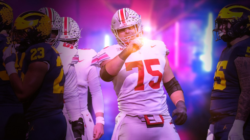 Nov 25, 2023; Ann Arbor, Michigan, USA; Ohio State Buckeyes offensive lineman Carson Hinzman (75) calls out a Michigan Wolverines defense during the NCAA football game at Michigan Stadium. Ohio State lost 30-24.