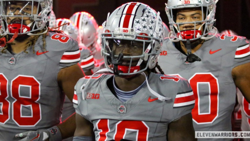 Denzel Burke in the gray uniforms